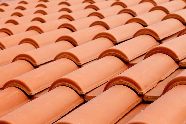 Background texture pattern of red ceramic roof shingles